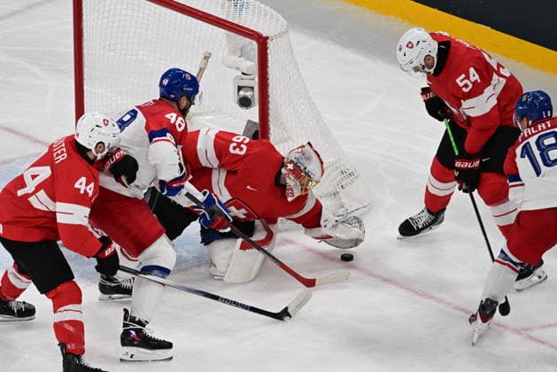 XXV Winter Olympic Games, Olympische Spiele, Olympia, OS in Milan, Italy, on February 15, 2026. Men s Ice hockey, Eishockey Group A, Switzerland vs Czech Republic. From left: Pius Suter (SUI), Tomas Hertl (CZE), goalkeeper Leonardo Genoni (SUI), Christian Marti (SUI) and Ondrej Palat (CZE). (CTKxPhoto MichalxKamaryt) CTKPhotoP2026021502752  CTKPhotoP2026021502752