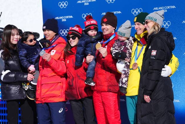 February 15, 2026, Livigno, Italy: From left, silver medalist Japan s Ikuma Horishima (2), gold medalist Canada s Mikael Kingsbury (4), and bronze medalist Australia s Matt Graham (6) pose with others after the men s freestyle skiing dual moguls finals at the 2026 Winter Olympics, in Livigno, Italy, Sunday, Feb. 15, 2026. Canada News - February 15, 2026  - ZUMAc35_ 20260215_zaf_c35_034 Copyright: xSeanxKilpatrickx