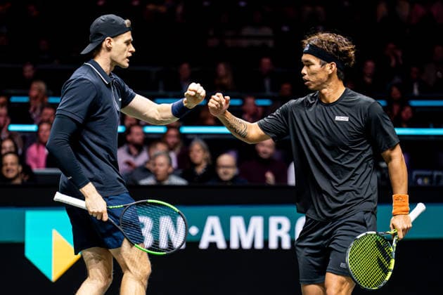2026-02-15 ABN AMRO Open - Day Seven ROTTERDAM, NETHERLANDS - FEBRUARY 15: Hendrik Jebens, Ray Ho fistbump during Day Seven of the ABN AMRO Open at Rotterdam Ahoy on February 15, 2026 in Rotterdam, Netherlands. (Photo by Gabriel Calvino Alonso BSR Agency) Rotterdam Netherlands Content not available for redistribution in The Netherlands directly or indirectly through any third parties. Copyright: xBSRxAgencyx