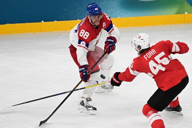 XXV Winter Olympic Games, Olympische Spiele, Olympia, OS in Milan, Italy, on February 15, 2026. Men s Ice hockey, Eishockey Group A, Switzerland vs Czech Republic. From left: David Pastrnak (CZE) and Michael Fora (SUI). (CTKxPhoto MichalxKamaryt) CTKPhotoP2026021504066  CTKPhotoP2026021504066