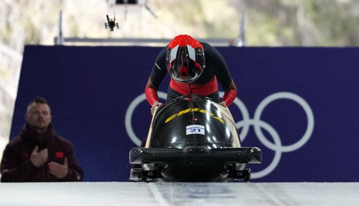 (260215) -- CORTINA D AMPEZZO, Feb. 15, 2026 -- Huai Mingming of China competes during the bobsleigh women s monobob heat at the 2026 Milan-Cortina Winter Olympics in Cortina, Italy, Feb. 15, 2026. ) (MICO2026)ITALY-CORTINA D AMPEZZO-OLYMPIC Winter games, Winterspiele,Spiele, Summer games BOBSLEIGH-WOMEN S MONOBOB-HEAT LixGang 