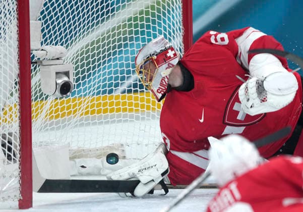 (260215) -- MILAN, Feb. 15, 2026 -- Leonardo Genoni, goalkeeper of Switzerland, fails to make a save during the Ice hockey, Eishockey men s preliminary round group A match between Switzerland and the Czech Republic of the Milan-Cortina 2026 Olympic Winter games, Winterspiele,Spiele, Summer games in Milan, Italy, Feb. 15, 2026. ) (MICO2026)ITALY-MILAN-OLYMPIC WINTER GAMES-ICE HOCKEY-MEN-PRELIMINARY-SUI VS CZE TaoxXiyi 