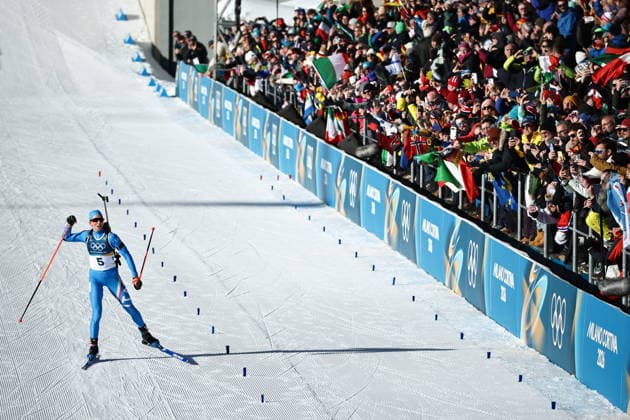 ITALY, TRENTINO-SOUTH TYROL - FEBRUARY 15, 2026: Lisa Vittozzi of Italy runs the women s 10km pursuit race during the 2026 Winter Olympic Games, Olympische Spiele, Olympia, OS at the Antholz-Anterselva Biathlon Arena. Mikhail Tereshchenko TASS  88755073
