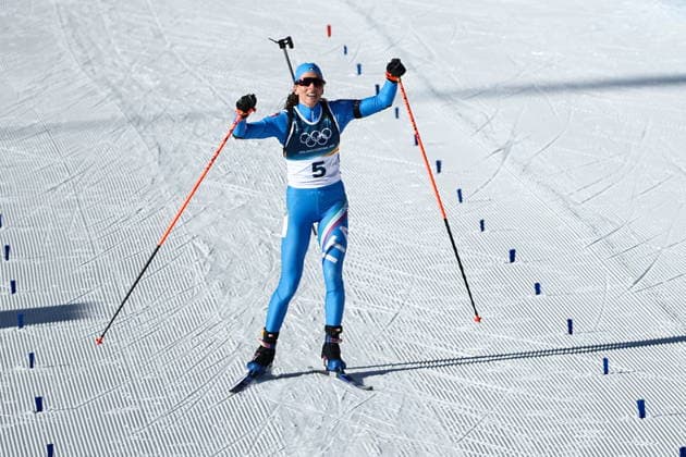 ITALY, TRENTINO-SOUTH TYROL - FEBRUARY 15, 2026: Lisa Vittozzi of Italy runs the women s 10km pursuit race during the 2026 Winter Olympic Games, Olympische Spiele, Olympia, OS at the Antholz-Anterselva Biathlon Arena. Mikhail Tereshchenko TASS  88755149