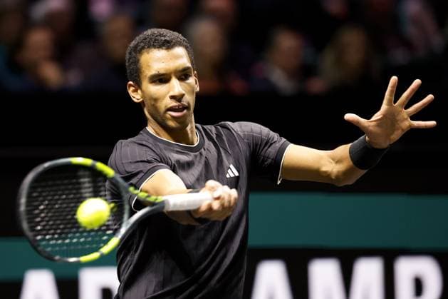 ROTTERDAM - Felix Auger-Aliassime (Canada) in action against Alex de Minaur (Australia) during the singles final on the final day of the ABN AMRO tennis tournament in Ahoy Rotterdam. BAS CZERWINSKI ANP xVIxANPxSportx xxANPxIVx 550791914 originalFilename: 550791914.jpg