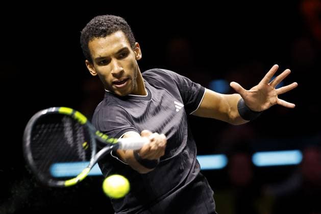 ROTTERDAM - Felix Auger-Aliassime (Canada) in action against Alex de Minaur (Australia) during the singles final on the final day of the ABN AMRO tennis tournament in Ahoy Rotterdam. BAS CZERWINSKI ANP xVIxANPxSportx xxANPxIVx 550791918 originalFilename: 550791918.jpg