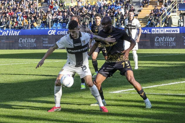 Enrico Delprato of Parma AC battle for the ball with Moatasem Al-Musrati of Hellas Verona FC during Parma Calcio vs Hellas Verona, 25Â° Serie A Enilive 2025-26 game at Ennio Tardini stadium in Parma (PR), Italy, on February 15, 2026.  Copyright: xDavidexCasentini IPAxSportx xipa-agency.netx xx IPA_71557580 IPA_Agency_IPA71557580