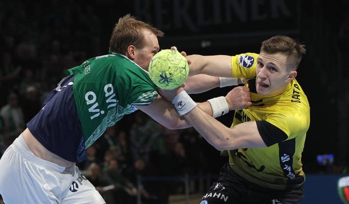 Max Darj, Simone Mengon on the ball duel Match scene Action Sport Handball HBL Bundesliga Men 21 Matchday Season 2025 2026 15 02 2026 Füchse Berlin vs TBV 1898 Stuttgart