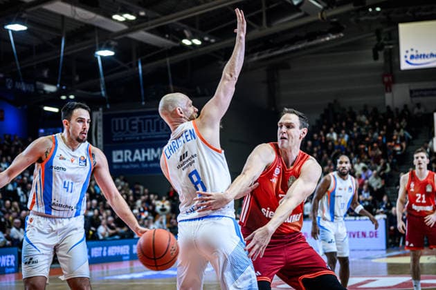 easycredit BBL Basketball Bundesliga 2025 2026 20 Matchday 15 02 2026 Science City Jena vs FC Bayern Munich Basketball v re Johannes Voigtmann Bayern on the ball against Robin Christen Jena Sparkassen Arena