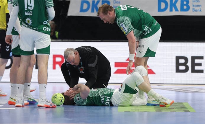 Nils Lichtlein injured after duel with Max Häfner Sport Handball HBL Bundesliga Men 21 Matchday Season 2025 2026 15 02 2026 Füchse Berlin vs TBV 1898 Stuttgart