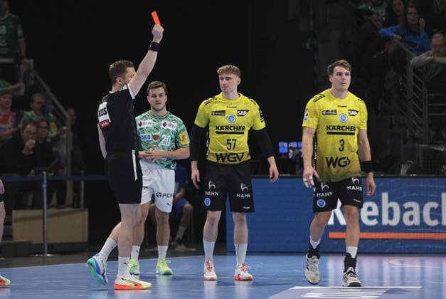 Max Häfner receives a red card after a foul on Nils Lichtlein Sport Handball HBL Bundesliga Men 21 Matchday Season 2025 2026 15 02 2026 Füchse Berlin vs TBV 1898 Stuttgart