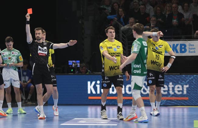 Max Häfner receives a red card after a foul on Nils Lichtlein Sport Handball HBL Bundesliga Men 21 Matchday Season 2025 2026 15 02 2026 Füchse Berlin vs TBV 1898 Stuttgart