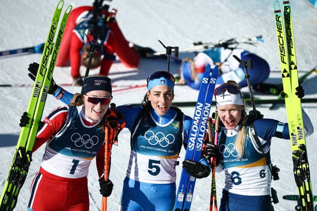 ITALY, TRENTINO-SOUTH TYROL - FEBRUARY 15, 2026: Maren Kirkeeide of Norway, Lisa Vittozzi of Italy and Suvi Minkkinen (L-R) of Finland pose together after the women s 10km pursuit race during the 2026 Winter Olympic Games, Olympische Spiele, Olympia, OS at the Antholz-Anterselva Biathlon Arena 2026 Winter Olympics: Biathlon  - ZUMAt113 20260215_zaa_t113_301 Copyright: xMikhailxTereshchenkox