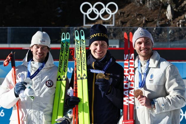 ITALY, TRENTINO-SOUTH TYROL - FEBRUARY 15, 2026: Sturla Holm Laegreid of Norway, Martin Ponsiluoma of Sweden and Emilien Jacquelin (L-R) of France pose together on a podium with their respective medals for the men s 12.5km pursuit race during the 2026 Winter Olympic Games, Olympische Spiele, Olympia, OS at the Antholz-Anterselva Biathlon Arena 2026 Winter Olympics: Biathlon  - ZUMAt113 20260215_zaa_t113_315 Copyright: xMikhailxTereshchenkox
