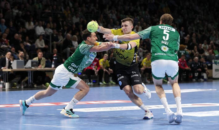 Lukas Herburger, Simone Mengon on the ball, Max Darj duel Game scene Action Sport Handball HBL Bundesliga Men 21 Matchday Season 2025 2026 15 02 2026 Füchse Berlin vs TBV 1898 Stuttgart
