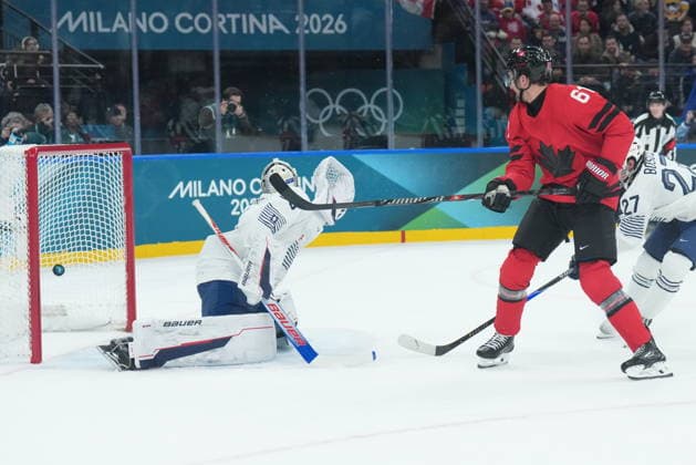February 15, 2026, Milan, ITALY: Mark Stone (61) of Team Canada scores a short-handed goal against Julian Junca (33) of Team France during first period Olympic hockey action at the 2026 Milan Cortina Winter Olympics in Milan, Italy on Sunday Feb. 15, 2026. Canada News - February 15, 2026  - ZUMAc35_ 20260215_zaf_c35_083 Copyright: xNathanxDenettex