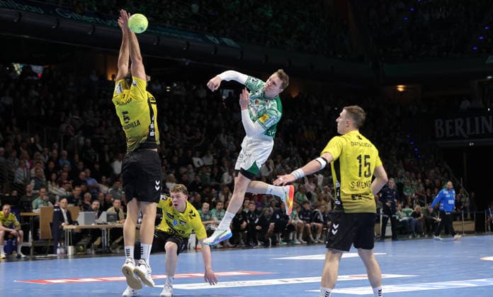 Antonio Serradilla, Lasse Andersson on the ball, Simone Mengon duel Match scene Action Sport Handball HBL Bundesliga Men 21 Matchday Season 2025 2026 15 02 2026 Füchse Berlin vs TBV 1898 Stuttgart