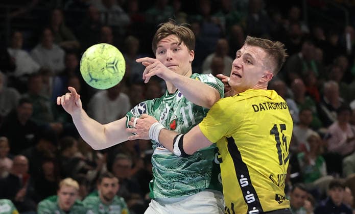 Mathias Gidsel on the ball, Simone Mengon duel Match scene Action Sport Handball HBL Bundesliga Men 21 Matchday Season 2025 2026 15 02 2026 Füchse Berlin vs TBV 1898 Stuttgart