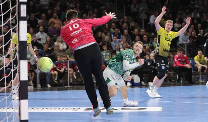 Mathias Gidsel scores his 200th BL goal against goalkeeper Miljan Vujovic duel Match scene Action Sport Handball HBL Bundesliga Men 21 Matchday Season 2025 2026 15 02 2026 Füchse Berlin vs TBV 1898 Stuttgart