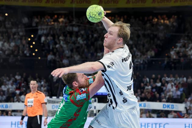 Albin Lagergren SC Magdeburg and Eric Johansson THW Kiel battle for the ball, DAIKIN Handball Bundesliga, THW Kiel v SC Magdeburg, Wunderino Arena on February 15, 2026 in Kiel, Germany Photo by Marco Steinbrenner DeFodi Images Albin Lagergren SC Magdeburg and Eric Johansson THW Kiel battle for the ball, DAIKIN Handball Bundesliga, THW Kiel v SC Magdeburg, Wunderino Arena, February 15, 2026 in Kiel, Germany Photo by Marco Steinbrenner DeFodi Images