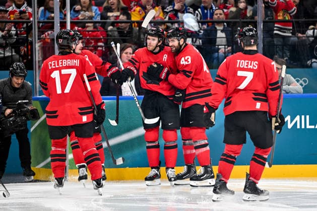 15 02 2026, Milano, Santa Giulia Ice hockey, Eishockey Arena, Winter Olympics: Canada - France (Ice Hockey), Connor McDavid of Canada celebrate his goal with Macklin Celebrini of Canada, Tom Wilson of Canada and Devon Toews of Canada Milano Santa Giulia Ice Hockey Arena Lombardy Italy *** 15 02 2026, Milano, Santa Giulia Ice Hockey Arena, Winter Olympics Canada France Ice Hockey , Connor McDavid of Canada celebrate his goal with Macklin Celebrini of Canada, Tom Wilson of Canada and Devon Toews of Canada Milano Santa Giulia Ice Hockey Arena Lombardy Italy Copyright: xJustPictures.ch AndreaxBrancax jp-en-AnBr-AB-AAB_583815022026