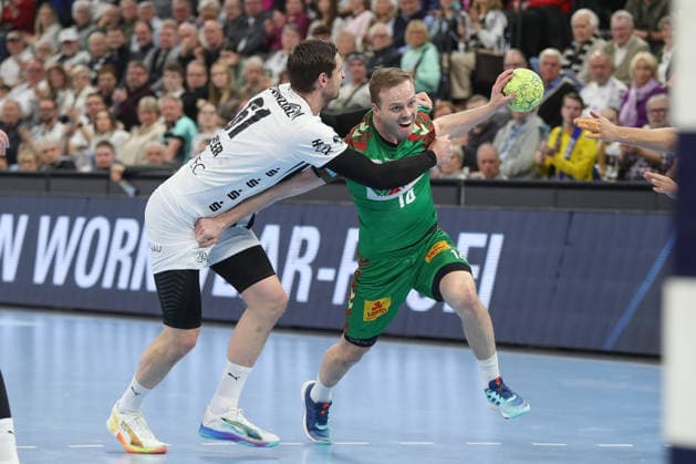 15 02 2026, xgox, Handball Daikin HBL THW Kiel SC Magdeburg emspor, v l Hendrik Pekeler Kiel, 61 , Omar Ingi Magnusson Magdeburg, 14 duel, duel, fight, tackle Kiel