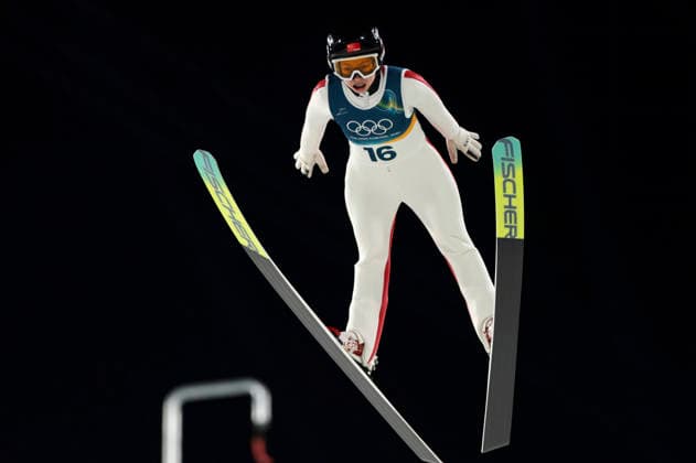 OLYMPICS - Winter Olympic Games, Olympische Spiele, Olympia, OS Milano Cortina 2026 PREDAZZO,ITALY,15.FEB.26 - OLYMPICS, Ski jumping, Skispringen, Ski, nordisch - Winter Olympic Games Milano Cortina 2026, large hill, women. Image shows Qi Liu (CHN).  GEPAxpictures xMatthiasxTrinkl