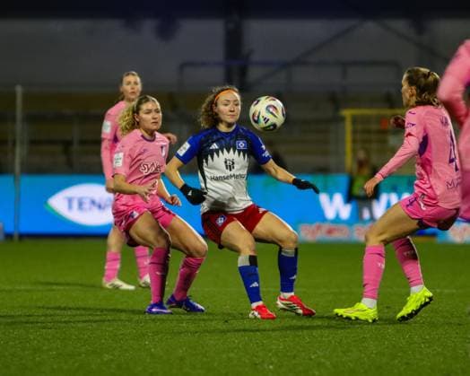 Melanie Brunnthaler 11 Hamburger SV controls the ball while Lisa Doorn 14 TSG Hoffenheim and Emilie Byrnak 3 TSG Hoffenheim defend GPFBL TSG Hoffenheim Hamburger SV Copyright: xMichaelxGelhardtx