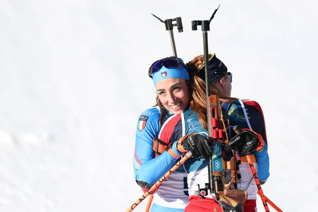 (260215) -- ANTERSELVA), Feb. 15, 2026 -- Lisa Vittozzi (L) of Italy hugs Maren Kirkeeide of Norway after the biathlon women s 10km pursuit at the 2026 Milan-Cortina Winter Olympics in Anterselva, Italy, Feb. 15, 2026. ) (MICO2026)ITALY-ANTERSELVA-OLYMPIC Winter games, Winterspiele,Spiele, Summer games BIATHLON-WOMEN S 10KM PURSUIT ZhangxTao 