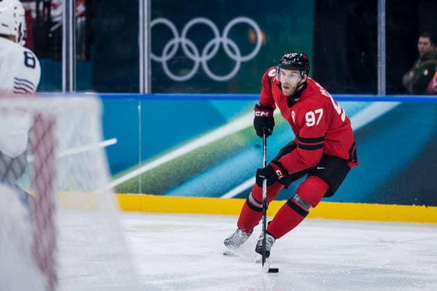 MILANO, ITALY - FEBRUARY 15: Connor McDavid (Canada, 97) controls the puck during the Ice hockey, Eishockey Men Canada vs France - Preliminary Round - Group A at the Milano Cortina 2026 Olympics at Milano Santagiulia Ice Hockey Arena on day 9 of the Milano Cortina 2026 Olympics on February 15, 2026 in Milano, Italy. Editorial use only. Italy Copyright: xSteffiexWunderlx
