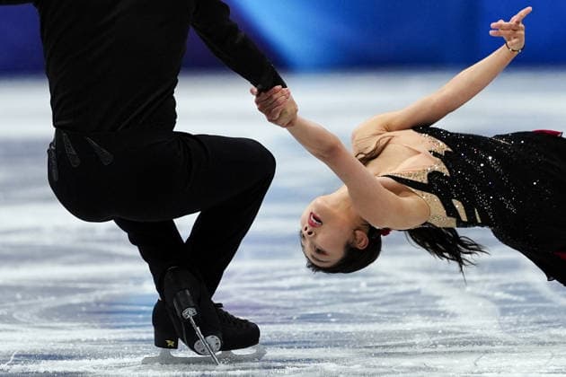 SUI Wenjing HAN Cong competing for the Olympic Figure skating, Eiskunstlauf Pair Skating, Short Program for the Milano Cortina 2026 Winter Olympics, in Milan (Italy) February 15, 2026 (Photo Claudio Furlan LaPresse)  Copyright: xClaudioxFurlan LaPressex