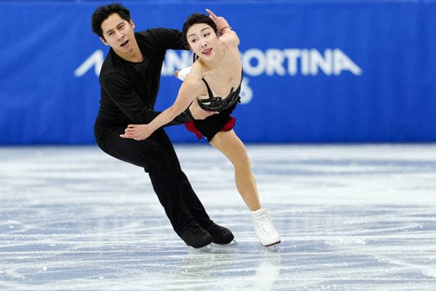SUI Wenjing HAN Cong competing for the Olympic Figure skating, Eiskunstlauf Pair Skating, Short Program for the Milano Cortina 2026 Winter Olympics, in Milan (Italy) February 15, 2026 (Photo Claudio Furlan LaPresse)  Copyright: xClaudioxFurlan LaPressex