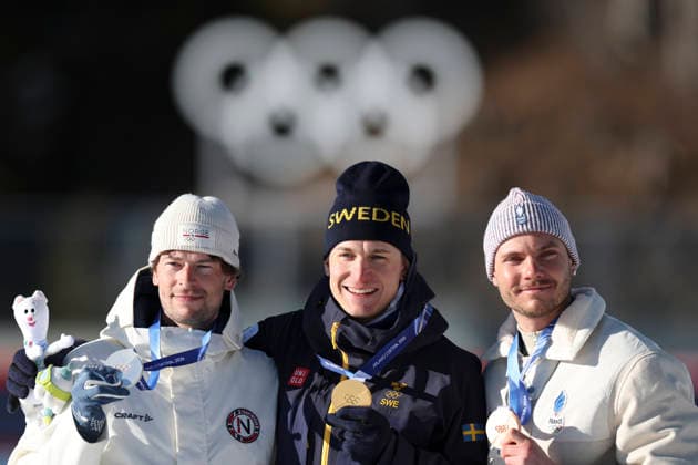 (260215) -- ANTERSELVA, Feb. 15, 2026 -- Gold medalist Martin Ponsiluoma (C) of Sweden, silver medalist Sturla Holm Laegreid (L) of Norway and bronze medalist Emilien Jacquelin of France pose for photos during the awarding ceremony of the biathlon men s 12.5km pursuit at the 2026 Milan-Cortina Winter Olympics in Anterselva, Italy, Feb. 15, 2026. ) (MICO2026)ITALY-ANTERSELVA-OLYMPIC Winter games, Winterspiele,Spiele, Summer games BIATHLON-MEN S 12.5KM PURSUIT ZhangxTao 