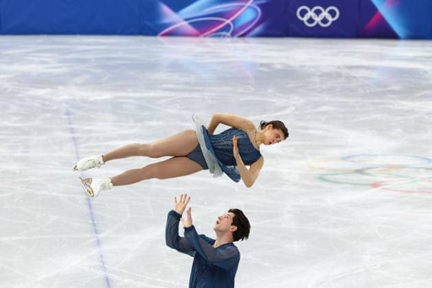February 15, 2026, Milan, Lombardy, Italy: ANASTASIIA GOLUBEVA and HEKTOR GIOTOPOULOS MOORE of Australia skate their short program in the Pairs of the Figure skating, Eiskunstlauf at the Milano Cortina 2026 Winter Olympic Games, Olympische Spiele, Olympia, OS Milan Italy - ZUMAc179 20260215_oly_c179_084 Copyright: xMickaelxChavetx