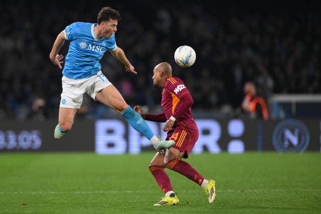 15th February 2026, Stadio Diego Armando Maradona, Naples, Italy; Serie A Football; Napoli versus Roma; Amir Rrahmani of SSC Napoli under pressure from Donyell Malen of AS Roma  AllShotLive Content restricted for UK based newspaper
