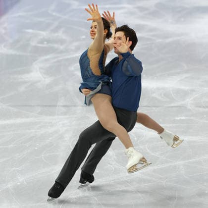 February 15, 2026, Milan, Lombardy, Italy: ANASTASIIA GOLUBEVA and HEKTOR GIOTOPOULOS MOORE of Australia skate their short program in the Pairs of the Figure skating, Eiskunstlauf at the Milano Cortina 2026 Winter Olympic Games, Olympische Spiele, Olympia, OS Milan Italy - ZUMAc179 20260215_oly_c179_095 Copyright: xMickaelxChavetx