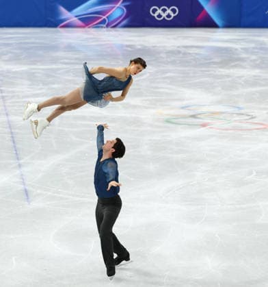 February 15, 2026, Milan, Lombardy, Italy: ANASTASIIA GOLUBEVA and HEKTOR GIOTOPOULOS MOORE of Australia skate their short program in the Pairs of the Figure skating, Eiskunstlauf at the Milano Cortina 2026 Winter Olympic Games, Olympische Spiele, Olympia, OS Milan Italy - ZUMAc179 20260215_oly_c179_096 Copyright: xMickaelxChavetx