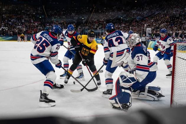 Parker Tuomie (Germany, 62) in action during the Menss Ice hockey, Eishockey group stage game between the United States (USA) and Germany (GER) at the Olympic Winter games, Winterspiele,Spiele, Summer games Milano Cortina 2026 at the Milano Santa Giulia Ice Hockey Arena, Milan, Italy, on February 15, 2026. im Gruppenspiel der Männer im Eishockey zwischen den USA (USA) und Deutschland (GER) bei den Olympischen Winterspielen Milano Cortina 2026 in der Milano Santa Giulia Ice Hockey Arena, Mailand, Italien, am 15. Februar 2026. *** Parker Tuomie Germany, 62 in action during the Mens ice hockey group stage game between the United States USA and Germany GER at the Olympic Winter Games Milano Cortina 2026 at the Milano Santa Giulia Ice Hockey Arena, Milan, Italy, on February 15, 2026 in the Mens ice hockey group stage game between the United States USA and Germany GER at the Olympic Winter Games Milano Cortina 2026 at the Milano Santa Giulia Ice Hockey Arena, Milan, Italy, on February 15, 2026 Copyright: HMBxMedia MarcxNiemeyer