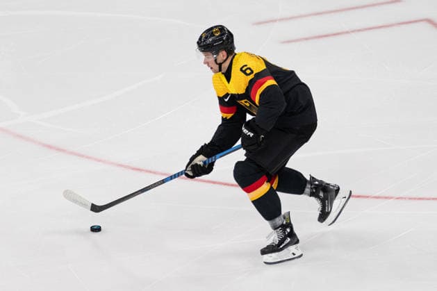 Kai Wissmann (Germany, 6) in action during the Menss Ice hockey, Eishockey group stage game between the United States (USA) and Germany (GER) at the Olympic Winter games, Winterspiele,Spiele, Summer games Milano Cortina 2026 at the Milano Santa Giulia Ice Hockey Arena, Milan, Italy, on February 15, 2026. im Gruppenspiel der Männer im Eishockey zwischen den USA (USA) und Deutschland (GER) bei den Olympischen Winterspielen Milano Cortina 2026 in der Milano Santa Giulia Ice Hockey Arena, Mailand, Italien, am 15. Februar 2026. *** Kai Wissmann Germany, 6 in action during the Mens ice hockey group stage game between the United States USA and Germany GER at the Olympic Winter Games Milano Cortina 2026 at the Milano Santa Giulia Ice Hockey Arena, Milan, Italy, on February 15, 2026 in the Mens ice hockey group stage game between the United States USA and Germany GER at the Olympic Winter Games Milano Cortina 2026 at the Milano Santa Giulia Ice Hockey Arena, Milan, Italy, on February 15, 2026 Copyright: HMBxMedia MarcxNiemeyer