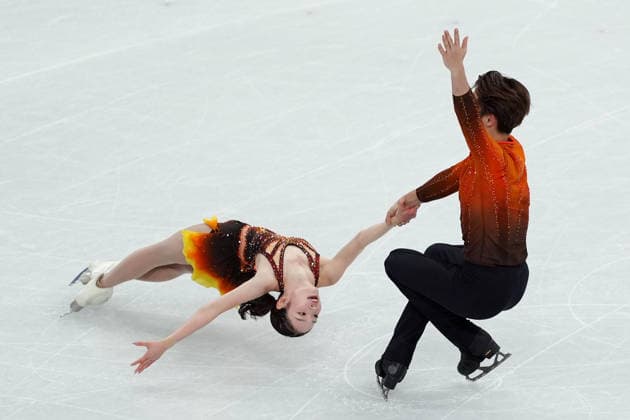 NAGAOKA Yuna MORIGUCHI Sumitada competing for the Olympic Figure skating, Eiskunstlauf Pair Skating, Short Program for the Milano Cortina 2026 Winter Olympics, in Milan (Italy) February 15, 2026 (Photo Claudio Furlan LaPresse)  Copyright: xClaudioxFurlan LaPressex