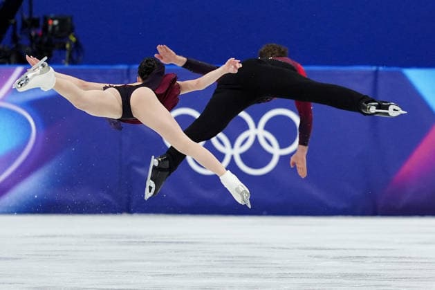 PEREIRA Lia MICHAUD Trennt competing for the Olympic Figure skating, Eiskunstlauf Pair Skating, Short Program for the Milano Cortina 2026 Winter Olympics, in Milan (Italy) February 15, 2026 (Photo Claudio Furlan LaPresse)  Copyright: xClaudioxFurlan LaPressex