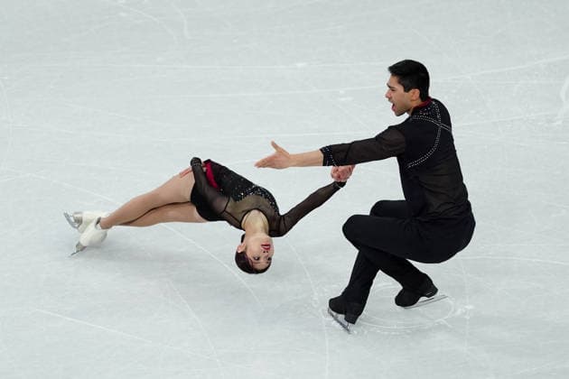 CHAN Emily HOWE Spencer Akira competing for the Olympic Figure skating, Eiskunstlauf Pair Skating, Short Program for the Milano Cortina 2026 Winter Olympics, in Milan (Italy) February 15, 2026 (Photo Claudio Furlan LaPresse)  Copyright: xClaudioxFurlan LaPressex