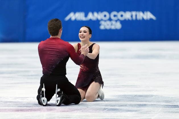 February 15, 2026, Milan, ITALY: Canada s Lia Pereira and Trennt Michaud react to their performance after competing during the pairs short program Figure skating, Eiskunstlauf event at the 2026 Winter Olympics, in Milan, on Sunday, Feb. 15, 2026. Canada News - February 15, 2026  - ZUMAc35_ 20260215_zaf_c35_163 Copyright: xDarrylxDyckx