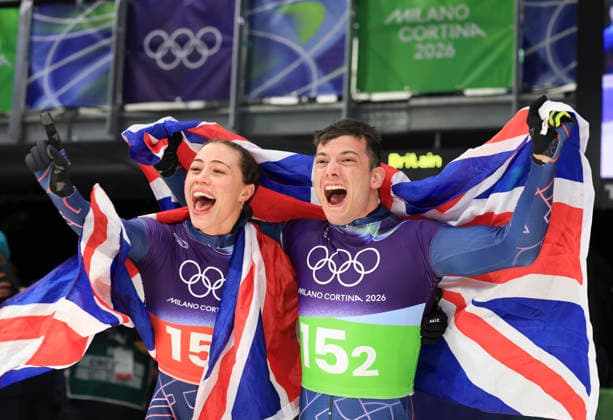 (260215) -- CORTINA D AMPEZZO, Feb. 15, 2026 -- Tabitha Stoecker (L) Matt Weston of Britain celebrate after the skeleton mixed team competition at the Milan-Cortina 2026 Olympic Winter games, Winterspiele,Spiele, Summer games in Cortina, Italy, Feb. 15, 2026. ) (MICO2026)ITALY-CORTINA D AMPEZZO-OLYMPIC WINTER GAMES-SKELETON MIXED TEAM DingxXu 