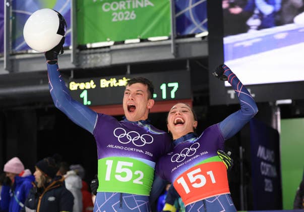 (260215) -- CORTINA D AMPEZZO, Feb. 15, 2026 -- Tabitha Stoecker (R) Matt Weston of Britain celebrate after the skeleton mixed team competition at the Milan-Cortina 2026 Olympic Winter games, Winterspiele,Spiele, Summer games in Cortina, Italy, Feb. 15, 2026. ) (MICO2026)ITALY-CORTINA D AMPEZZO-OLYMPIC WINTER GAMES-SKELETON MIXED TEAM DingxXu 