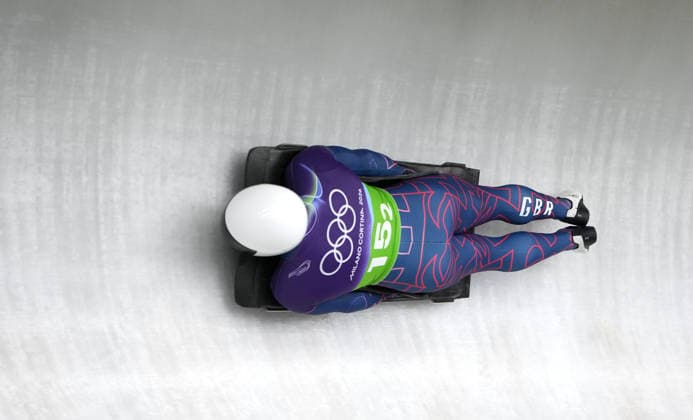 (260215) -- CORTINA D AMPEZZO, Feb. 15, 2026 -- Matt Weston of Britain competes during the skeleton mixed team event at the Milan-Cortina 2026 Olympic Winter games, Winterspiele,Spiele, Summer games in Cortina, Italy, Feb. 15, 2026. ) (MICO2026)ITALY-CORTINA D AMPEZZO-OLYMPIC WINTER GAMES-SKELETON MIXED TEAM LixGang 