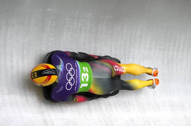 (260215) -- CORTINA D AMPEZZO, Feb. 15, 2026 -- Axel Jungk of Germany competes during the skeleton mixed team event at the Milan-Cortina 2026 Olympic Winter games, Winterspiele,Spiele, Summer games in Cortina, Italy, Feb. 15, 2026. ) (MICO2026)ITALY-CORTINA D AMPEZZO-OLYMPIC WINTER GAMES-SKELETON MIXED TEAM LixGang 