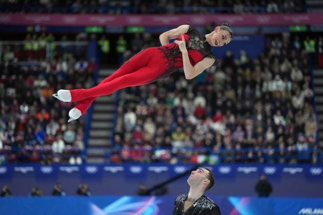 February 15, 2026, Milan, ITALY: Georgia s Anastasiia Metelkina and Luka Berulava compete during the pairs short program Figure skating, Eiskunstlauf event at the 2026 Winter Olympics, in Milan, on Sunday, Feb. 15, 2026. Canada News - February 15, 2026  - ZUMAc35_ 20260215_zaf_c35_188 Copyright: xDarrylxDyckx