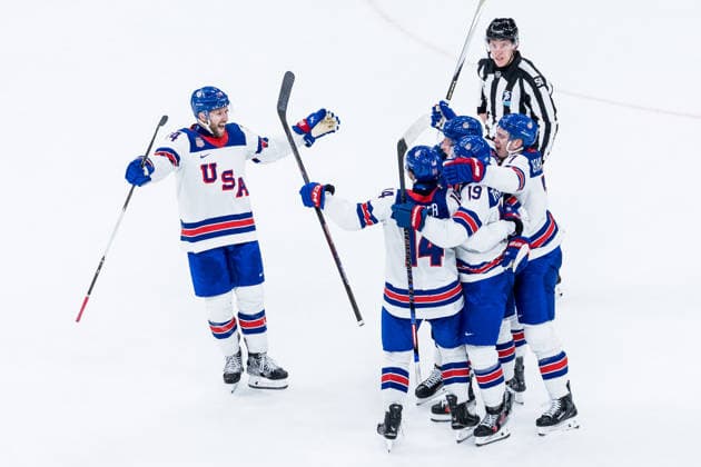 MILANO, ITALY - FEBRUARY 15: Team USA cheers after scoring a goal during the Ice hockey, Eishockey Men United States of America vs Germany - Preliminary Round - Group C at the Milano Cortina 2026 Olympics at Milano Santagiulia Ice Hockey Arena on day 9 of the Milano Cortina 2026 Olympics on February 15, 2026 in Milano, Italy. Editorial use only. Italy Copyright: xSteffiexWunderlx
