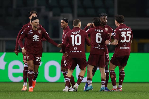 Turin, Italy, 15th February 2026. Nikola Vlasic of Torino FC celebrates with team mates after scoring to level the game at 1-1 during the Torino vs Bologna Serie A match at Stadio Grande Torino, Turin. Picture credit should read: Jonathan Moscrop Sportimage EDITORIAL USE ONLY. No use with unauthorised audio, video, data, fixture lists, club league logos or live services. Online in-match use limited to 120 images, no video emulation. No use in betting, games or single club league player publications. SPI_041_TORO_BOLOGNA SPI-4525-0041